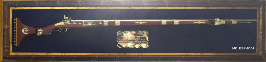 espingarda enmarcada